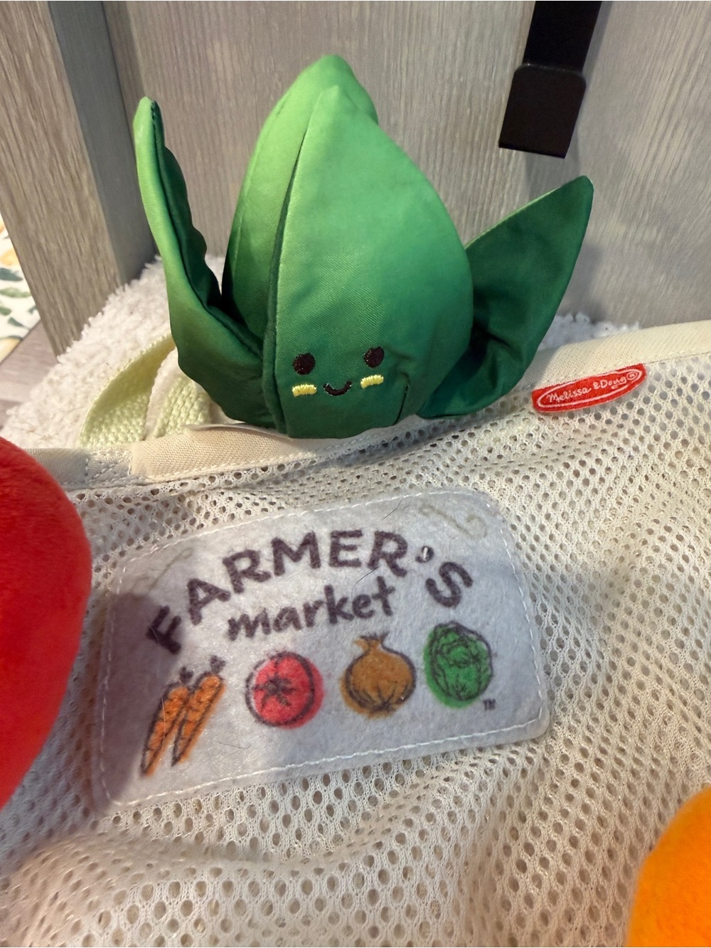 Melissa & Doug Farmer’s Market Fill & Spill Plush Play Food Set Mesh Tote Toy - Picture 9 of 11